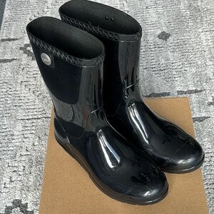 UGG women’s rain boots; approx 10 1/4” tall ; preloved but these last forever